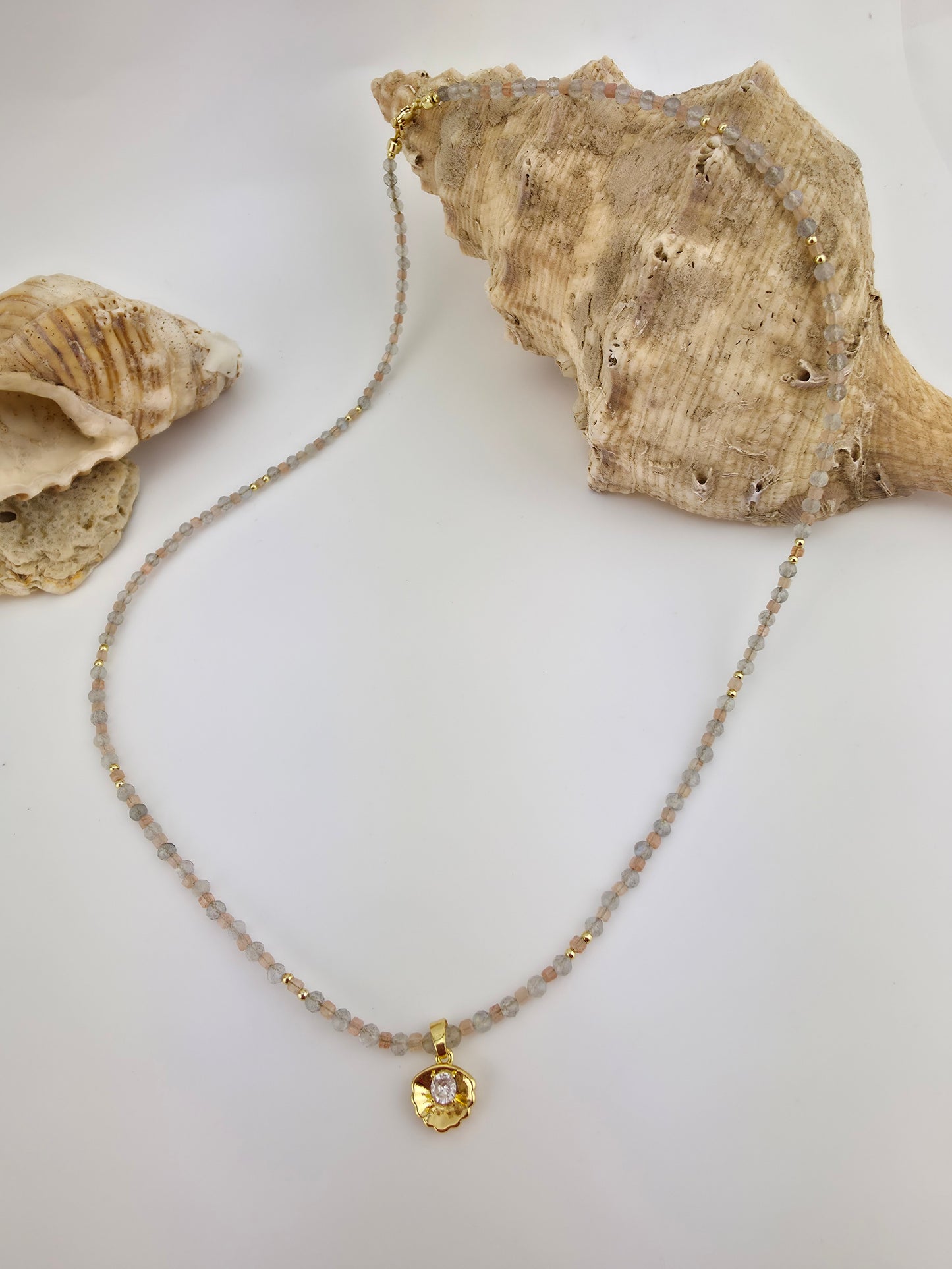 Labradorite/orange moonstone.